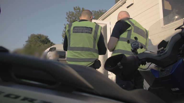 Immigration enforcement workers at a caravan site in Surrey. Pic: Home Office