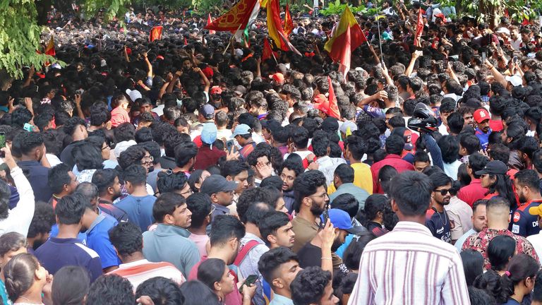 Fans gathered to celebrate outside the stadium. Pic: Reuters