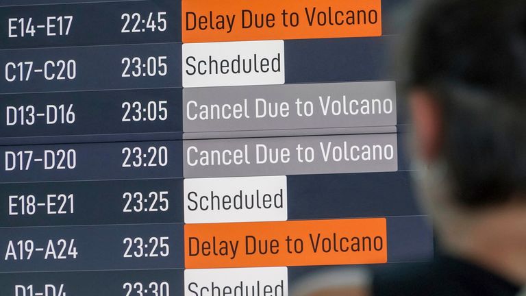A Passenger Checks An Information Board Showing Disrupted Flight Schedule Due to the Eruption of Mount Lewotobi Laki-Laki.  PIC: AP