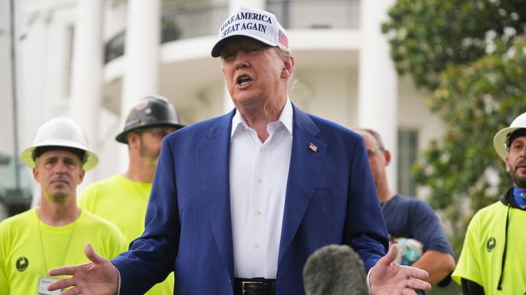 Donald Trump speaks on the South Lawn of the White House. Pic: AP