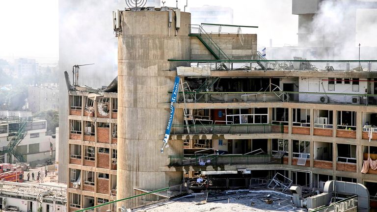 Smokes raises from a building of the Soroka hospital complex after it was hit by a missile fired from Iran in Beer sheba, Israel.
Pic: AP