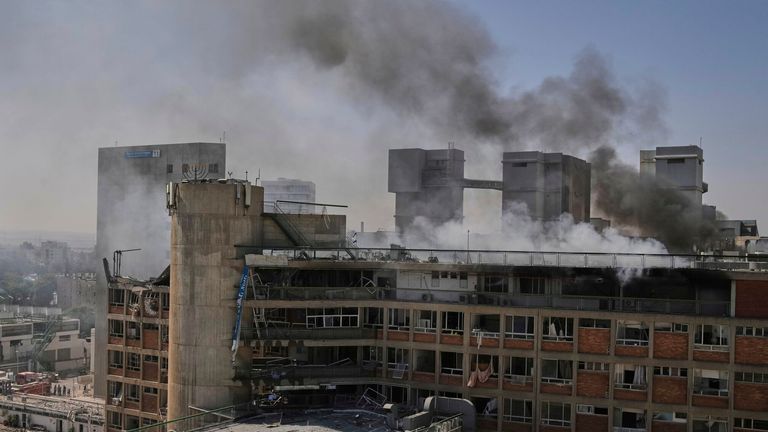 Smoke billows from Israel's main hospital after an Iranian strike. Pic: AP
