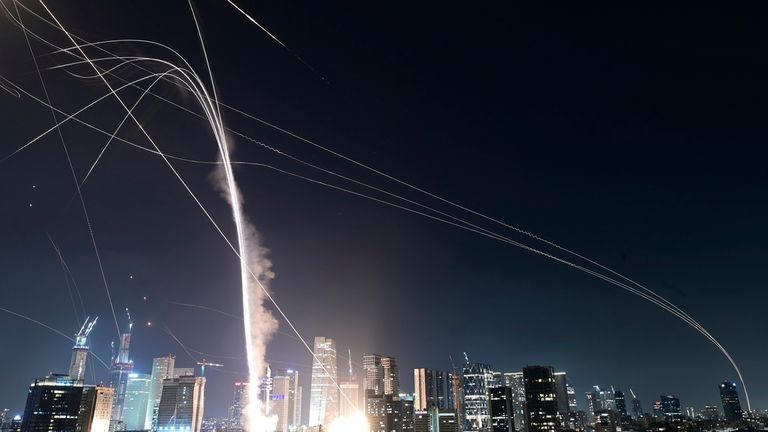 Israeli Iron Dome air defense system fires to intercept missiles over Tel Aviv, Israel, Friday, June 13, 2025. (AP Photo/Tomer Neuberg)