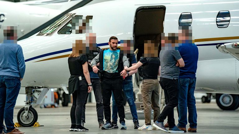 James Harding being arrested by officers from the Metropolitan Police following his extradition from Switzerland.
Pic: PA