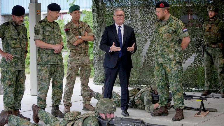 Keir Starmer watches a demonstration by troops as he visits the Netherlands marines training base.
Pic: AP