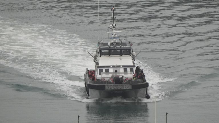 A rescue vessel heads towards Dover after picking up migrants travelling on small boats. Pic: PA
