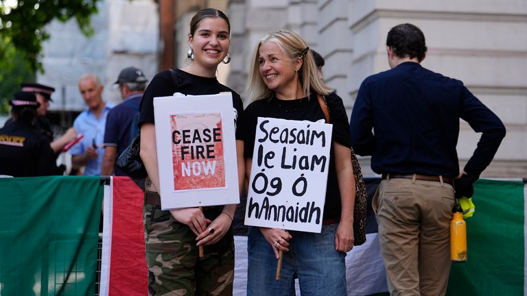Supporters of Kneecap's Liam Og O Hannaidh outside Westminster Magistrates' Court in London, where he is appearing charged with a terrorism offence. The 27-year-old from Belfast, who performs under the stage name Mo Chara and is also known as Liam O'Hanna, has been charged with a terrorism offence relating to displaying a flag in support of Hezbollah at a gig at the O2 Forum in Kentish Town on November 21. Picture date: Wednesday June 18, 2025. PA Photo. Photo credit should read: Jordan Pettitt/PA Wire
