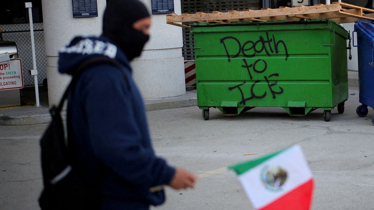 'Death to ICE', Immigration and Customs Enforcement, is written on a bin in downtown Los Angeles on Friday. Pic: Reuters