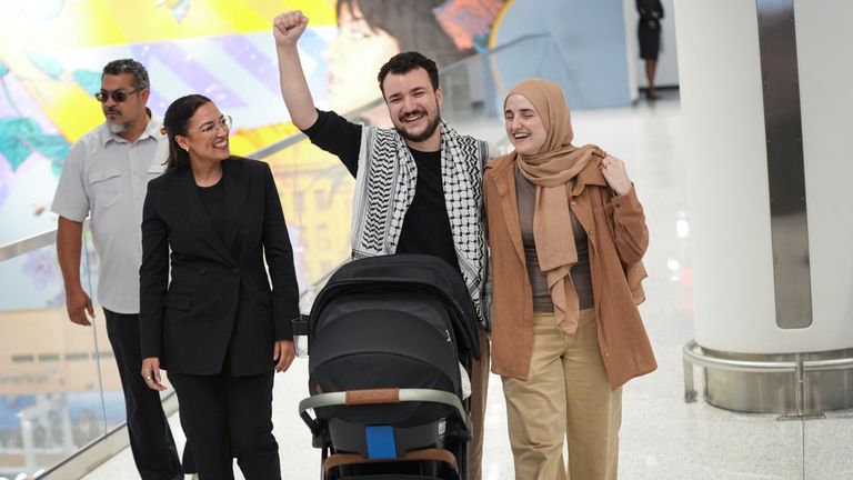 Columbia University graduate student Mahmoud Khalil walks with his wife Dr. Noor Abdalla and U.S. Rep. Alexandria Ocasio-Cortez (D-NY) at Newark airport, a day after being released from immigration custody, in Newark, New Jersey, U.S., June 21, 2025. REUTERS/Angelina Katsanis