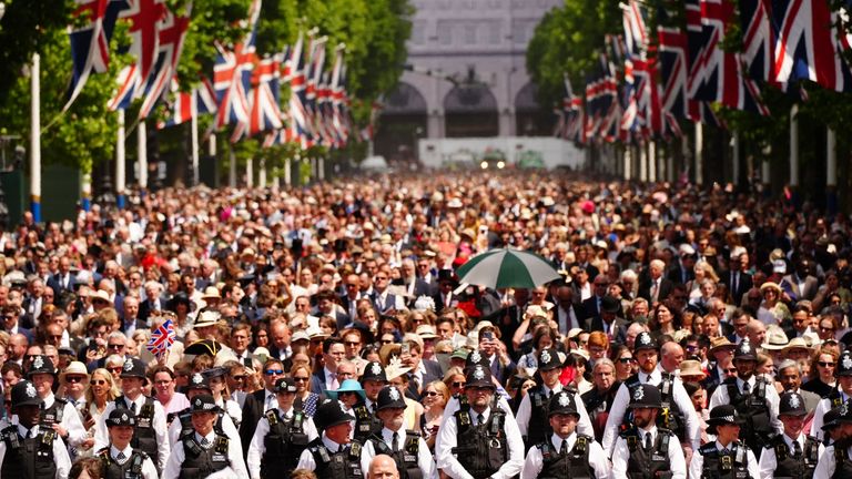 Crowds fill the Mall. Pic. PA