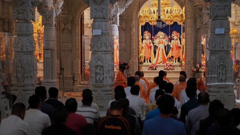 People attend prayers at the Hindu Neasden Temple, London, Thursday, June 12, 2025, for the victims of the Air India aircraft crash. Pic:AP 