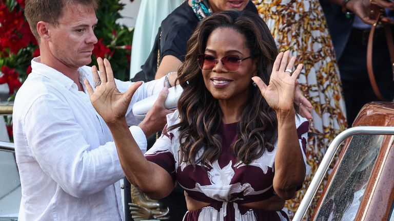 Oprah Winfrey gestures near Gritti Palace Hotel, ahead of the wedding of Amazon founder Jeff Bezos and Lauren Sanchez in Venice, Reuters