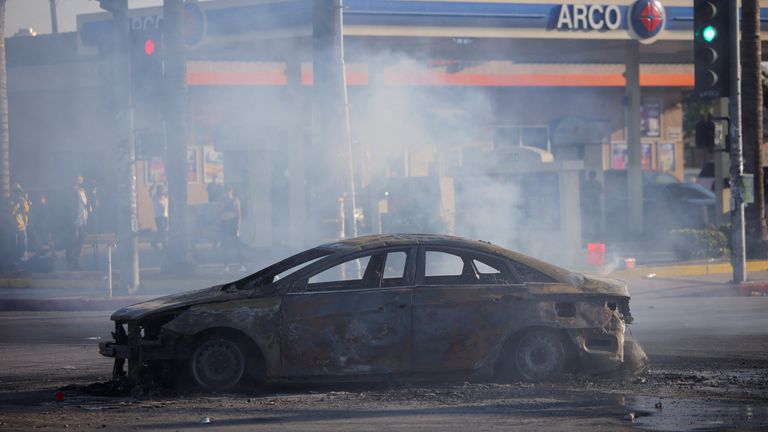 The car burnt out in Paramount on Saturday. Pic: Reuters