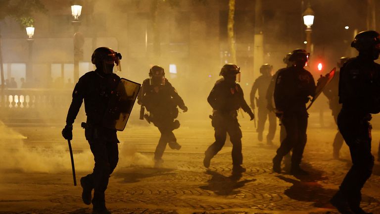 Soccer Football - Champions League - Final - Paris St Germain fans gather in Paris - Paris, France - May 31, 2025 Riot police on the Champs 
