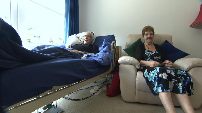 Philip with his wife by his bedside