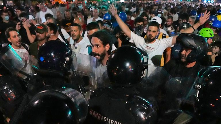 Riot police block anti-government protesters. Pic: AP