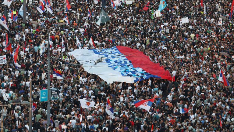 People attend a major anti-government rally in Belgrade, Serbia, Saturday, June 28, 2025. (AP Photo/Marko Drobnjakovic)