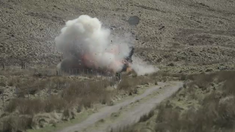A tank after being hit by a STARK drone on a testing field