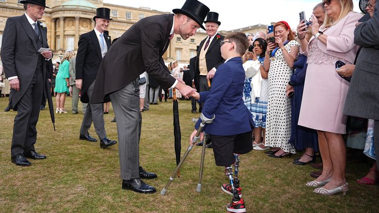 The Prince of Wales meets Tony Hudgell during a Royal Garden Party at Buckingham Palace, London. Picture date: Tuesday May 20, 2025.