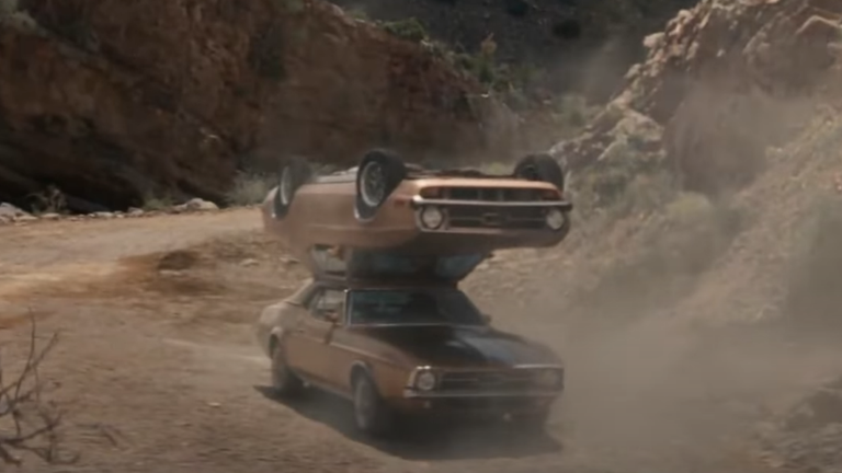 Two cars, one's roof laying on top of the other's roof, in a banned advert from Mars Wrigley Confectionery UK Ltd. Pic: TWIX / YouTube
