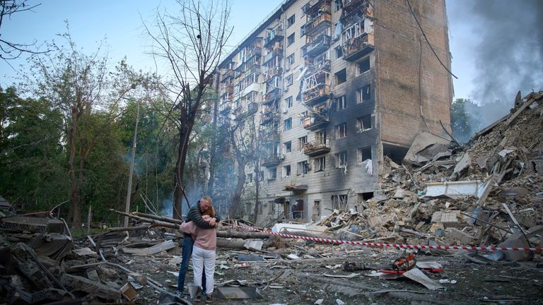 A multi-storey apartment in Kyiv was struck. Pic: AP