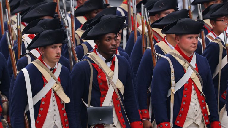 Soldiers in period-style uniforms. Pic: Reuters