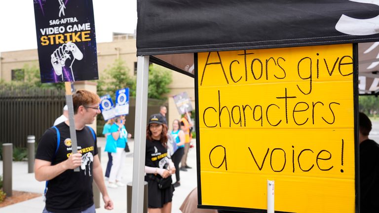 Demonstrators during a SAG-AFTRA video game actor strike picket line outside Warner Bros Studios in August 2024. File pic: AP