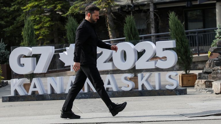 Ukrainian President Volodymyr Zelenskyy walks during the G7 Leaders' Summit.
Pic: Reuters