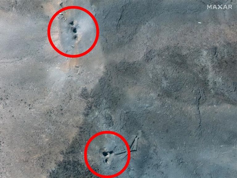 A satellite image showing two clusters of holes at the Fordow nuclear site in Iran following US strikes on the facility. Pic: Maxar