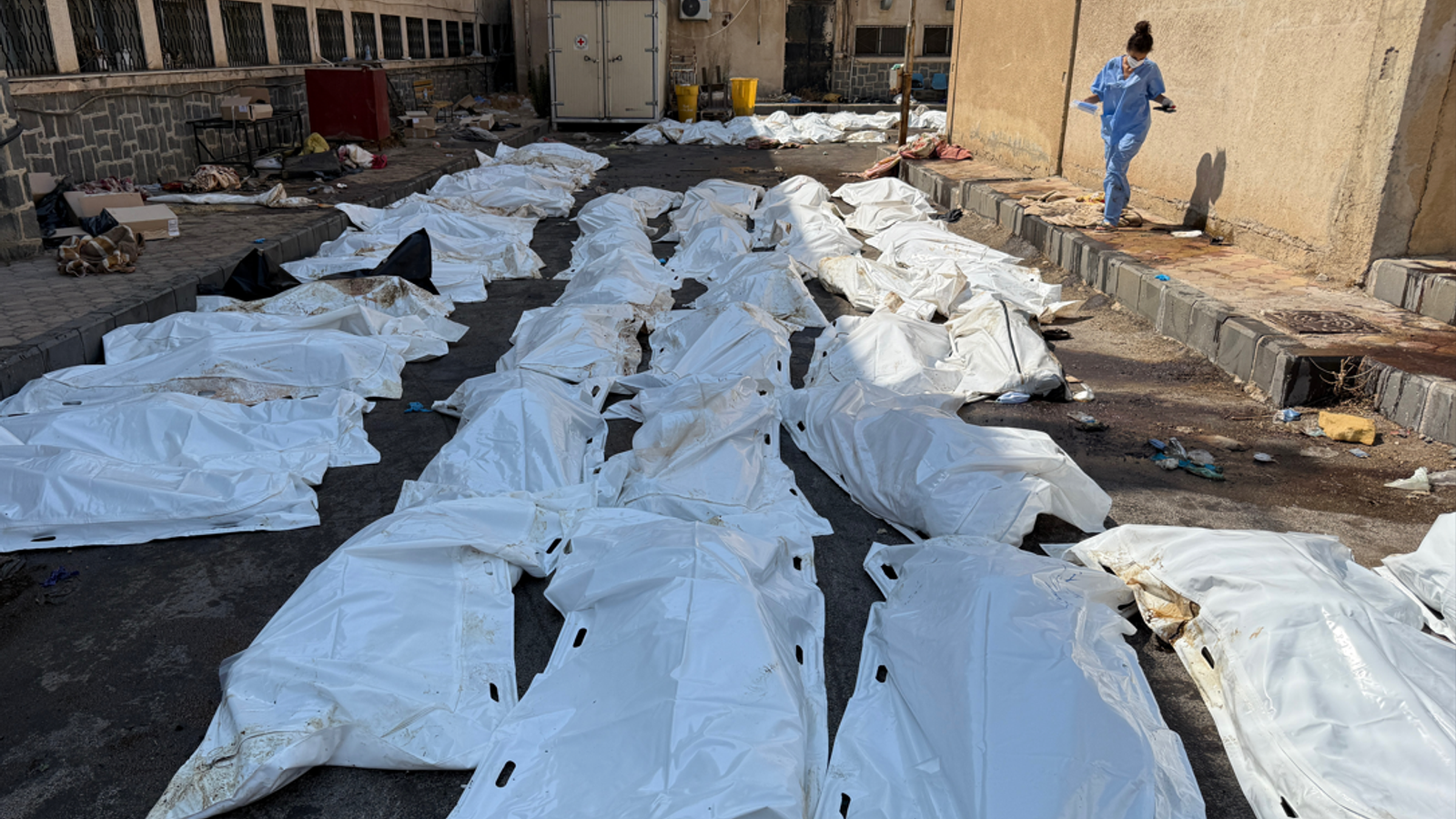 Rows of decomposing bodies that haven't been buried because of fierce fighting in Syrian city