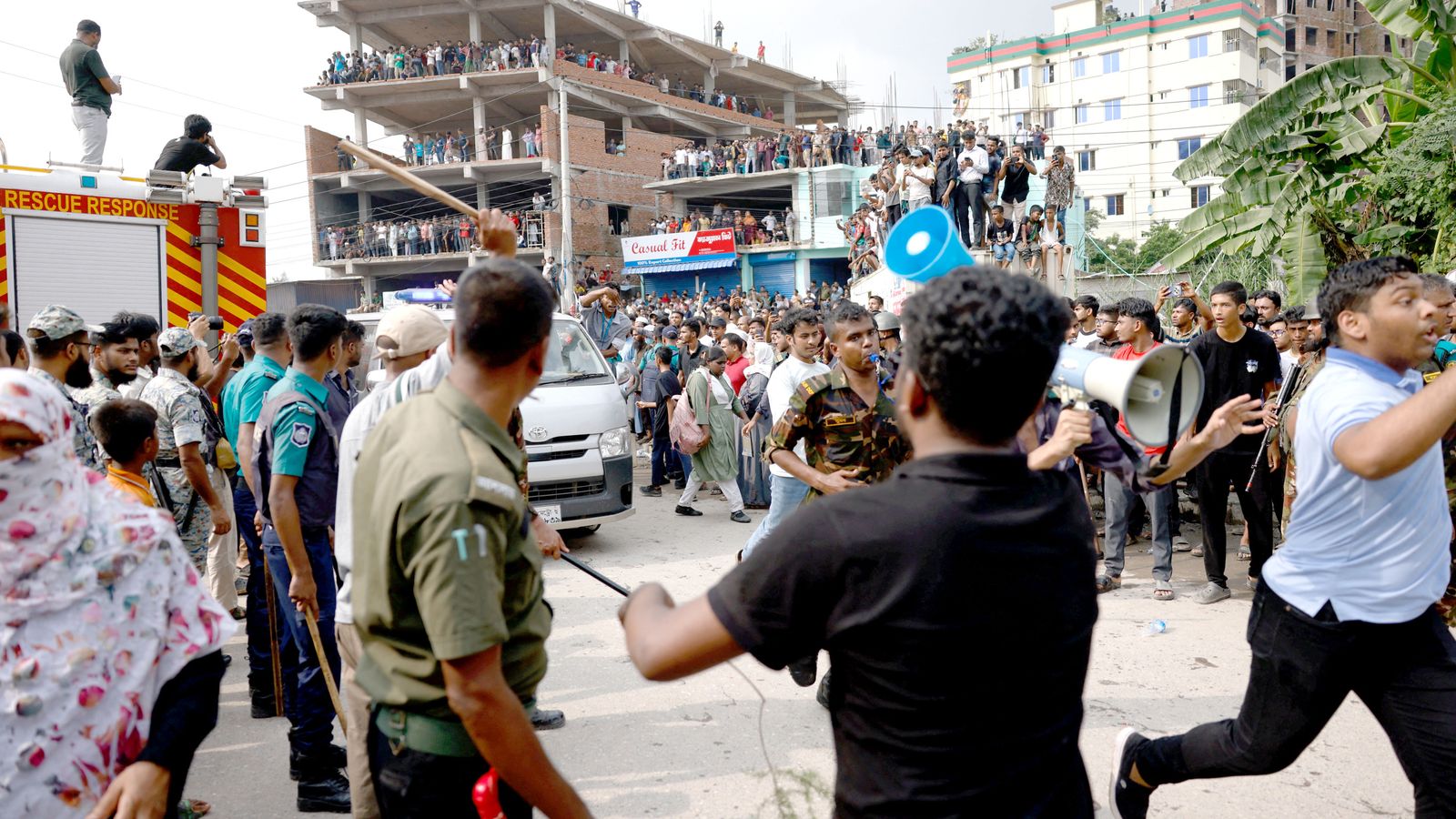 At least 16 dead after plane crashes into college campus in Bangladesh