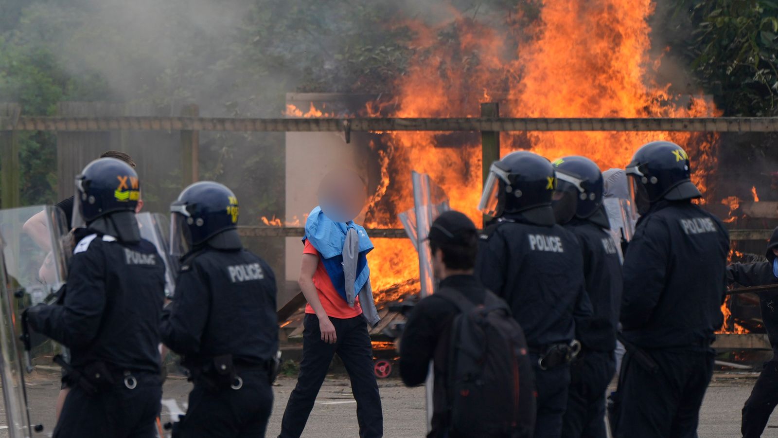 Ski masks and bags full of alcohol: Couple relive watching Rotherham riots unfold on their doorstep