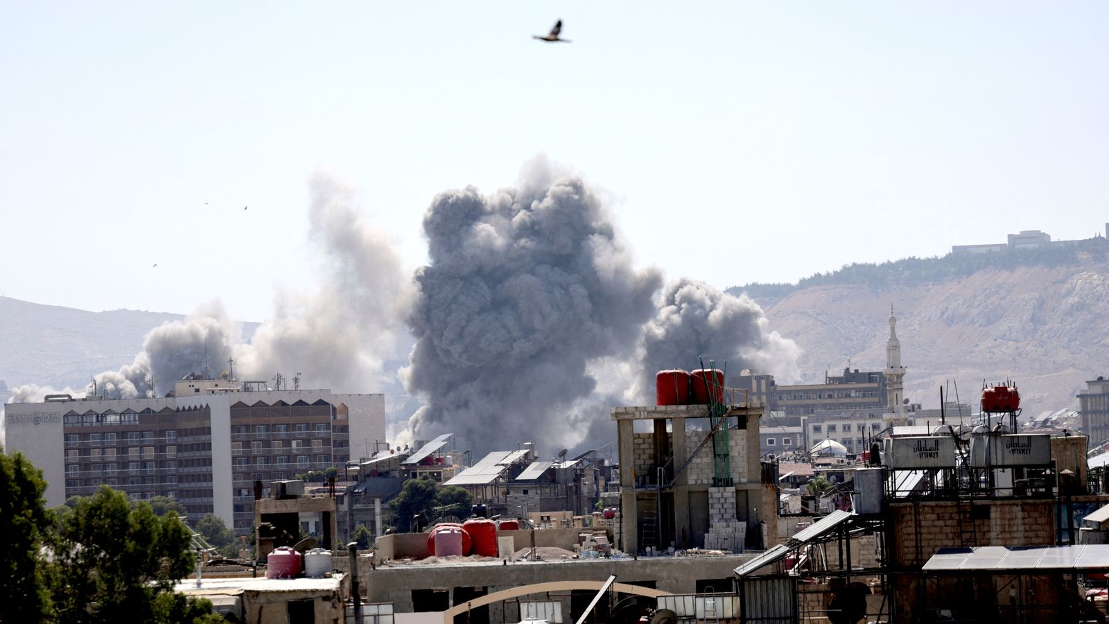 Israel attacks Syrian military HQ in Damascus - and issues warning to leave religious minority group alone