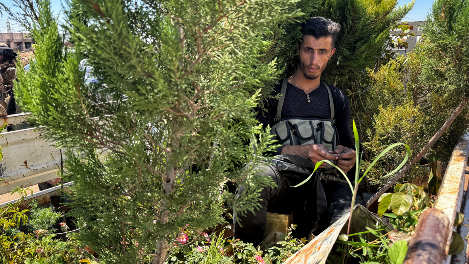 The Syrian city ravaged by sectarian violence - where bodies line streets and homes are burned