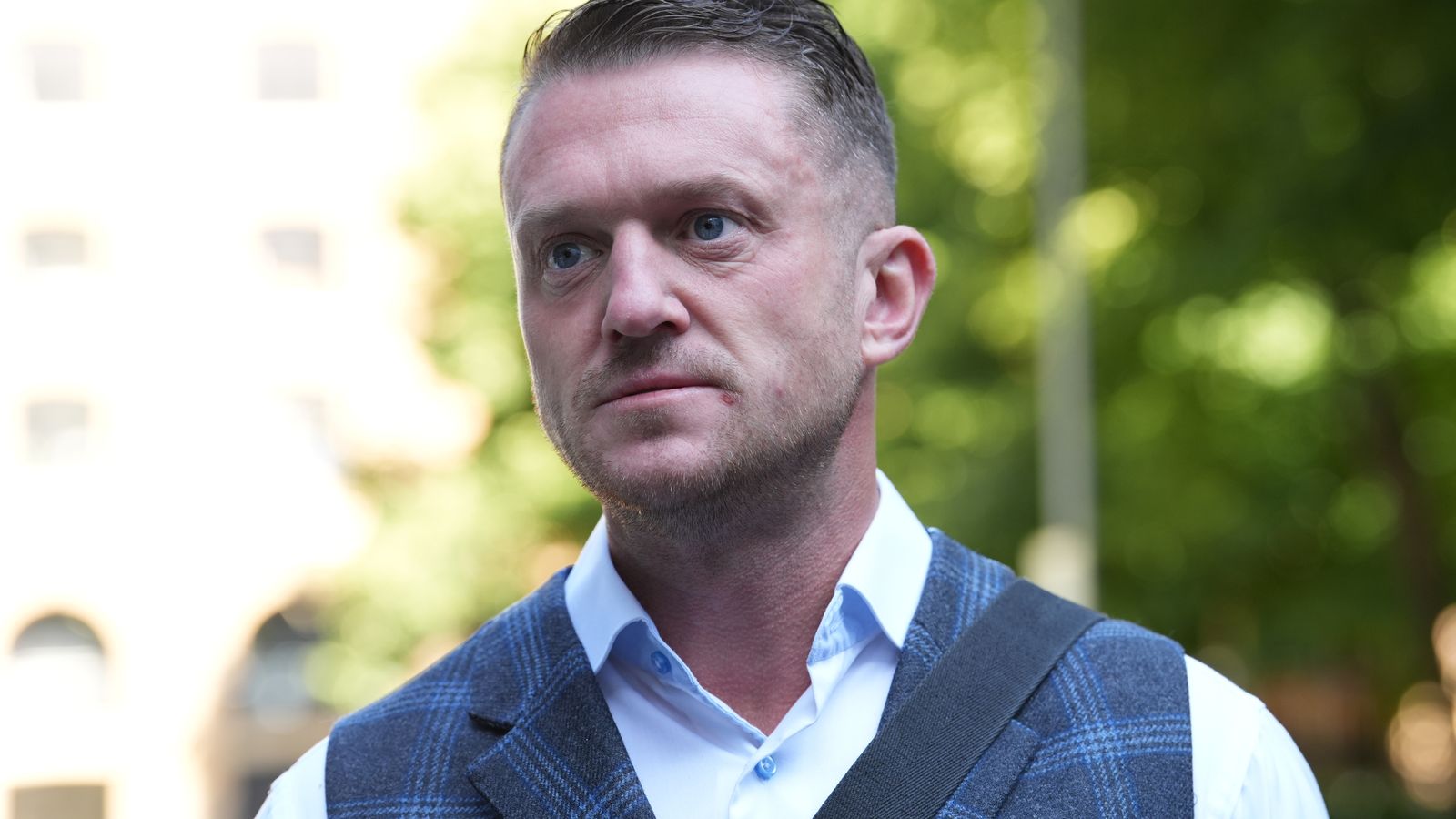 Police investigate assault as video appears to show Tommy Robinson at station