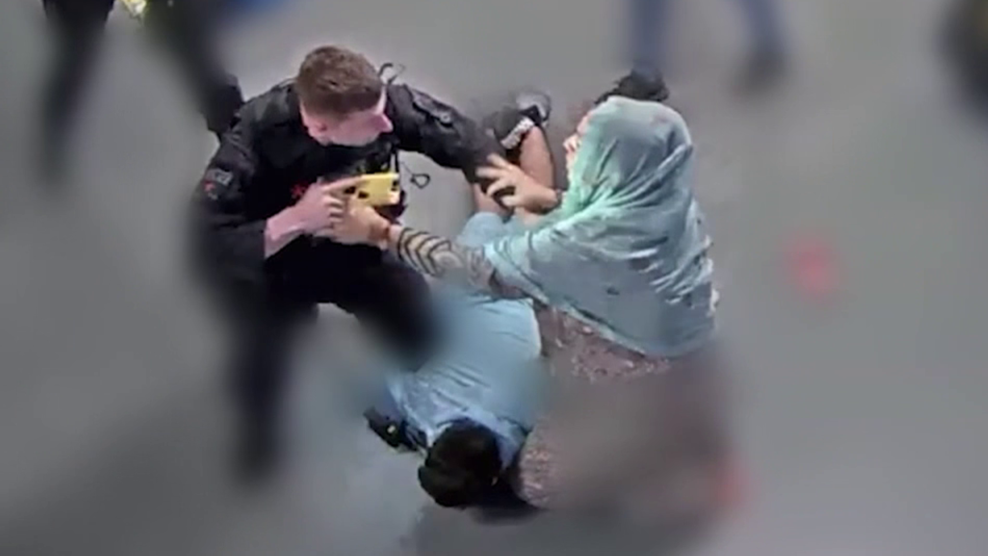 Officer denies he 'lost control' attempting to arrest brothers at Manchester Airport, court hears