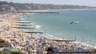 People enjoying the warm weather on Bournemouth Beach. File pic: PA