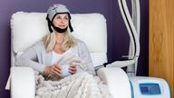 The method sees a patient wear a cold cap to help reduce hair loss from cancer drugs. Pic: Paxman Scalp Cooling/PA