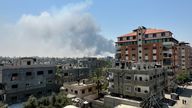 Smoke rises during Israeli strikes amid the Israeli military operation in Deir Al-Balah.
Pic: Reuters