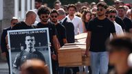 Pallbearers carry the coffins of Liverpool's Portuguese soccer player Diogo Jota and his brother Andre Silva, who died in a car crash near Z