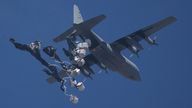 A plane drops aid over Gaza City on Sunday. Pic: AP