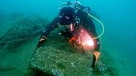 Diving the Northumberland wreck to survey its condition. A diver examining a wooden chest from the Northumberland wreck. Pic: MSDS Marine