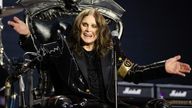 Ozzy wore a shiny black jacket and a gold armband bearing his name. Pic: Ross Halfin