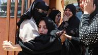 Palestinians mourn a loved one following the incident near the aid centre. Pic: Reuters