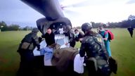 An injured Thai soldier who stepped on a land mine being airlifted to a hospital in Ubon Ratchathan, Thailand.
Pic: The Royal Thai Army/AP