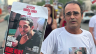 Stills from Holland PKG on Yehuda Cohen (pictured) whose son Nimrod Cohen (poster), an 19 y/o IDF soldier, is being held hostage by Hamas.