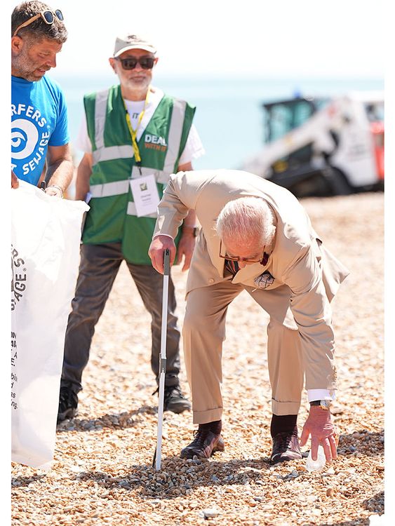 King Charles meets volunteers taking part in a community beach clean-up initiative along the coastline in Deal, Kent 
Pic: PA