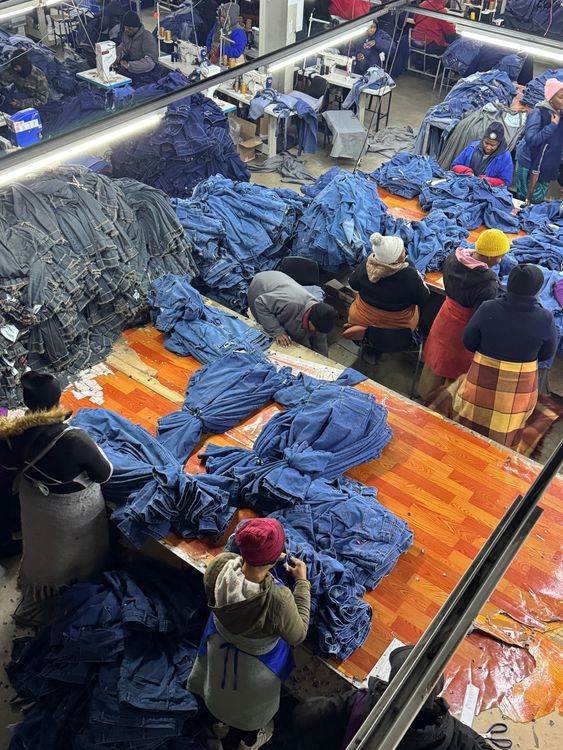 A government-sponsored warehouse in Maputosoe, Lesotho - 5km away from South Africa - where women make clothes