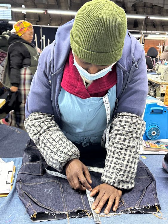 A worker in a government-sponsored warehouse in Maputosoe, Lesotho - 5km away from South Africa - where women make clothes PORTRAIT