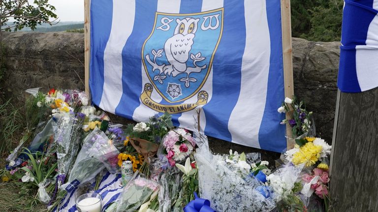 Tributes at the scene after Bailey Chadwick was killed in a hit and run on Sunday near Pateley Bridge, North Yorkshire. Picture date: Wednes